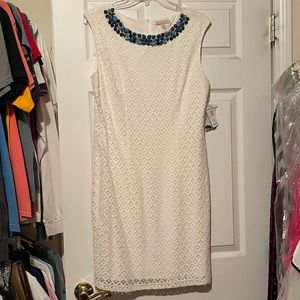 Cream dress with beaded neckline